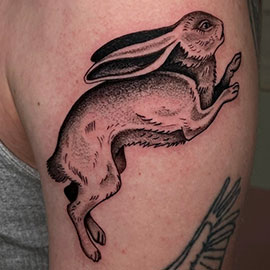 Flash rabbit blackwork fineline design by sheila.tattoos Lights Out Tattoo Santa Cruz CA