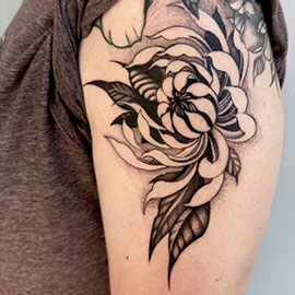 Custom Stylized Chrysanthemum Flower Blackwork Design tattooed by sheila.tattoos - Lights Out Tattoo Santa Cruz CA