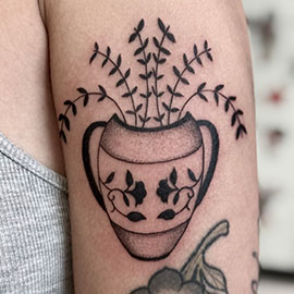 Flower Vase with delicate flowers, blackwork design by sheila.tattoos Lights Out Tattoo Santa Cruz CA